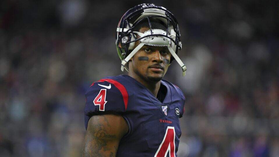Houston Texans quarterback Deshaun Watson (4) waits as officials review a play against the New England Patriots during the second half of an NFL football game Sunday, Dec. 1, 2019, in Houston
