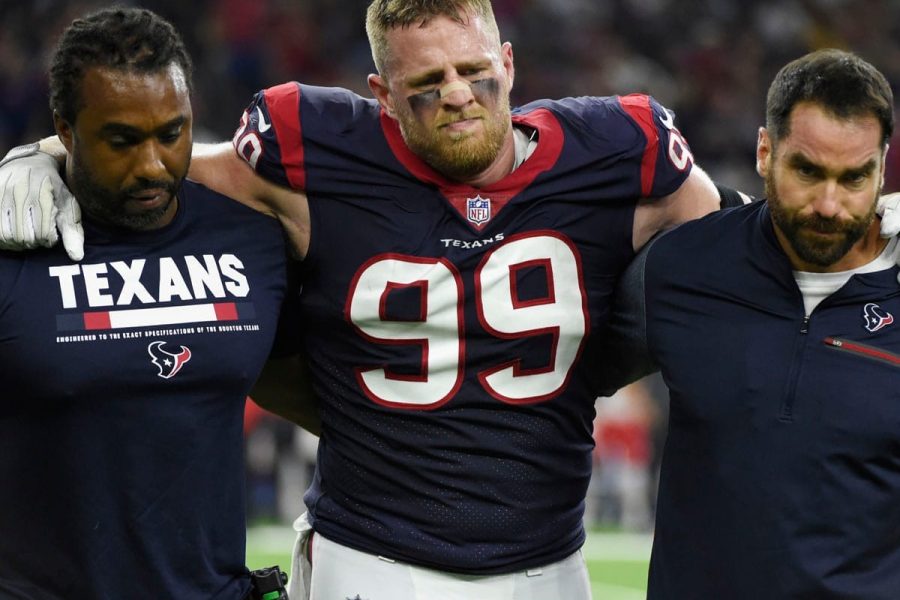 Houston Texans defensive end J.J. Watt (99) is helped off the field after an injury during the first half of an NFL football game Sunday, Oct. 8, 2017, in Houston. (AP Photo/Eric Christian Smith)