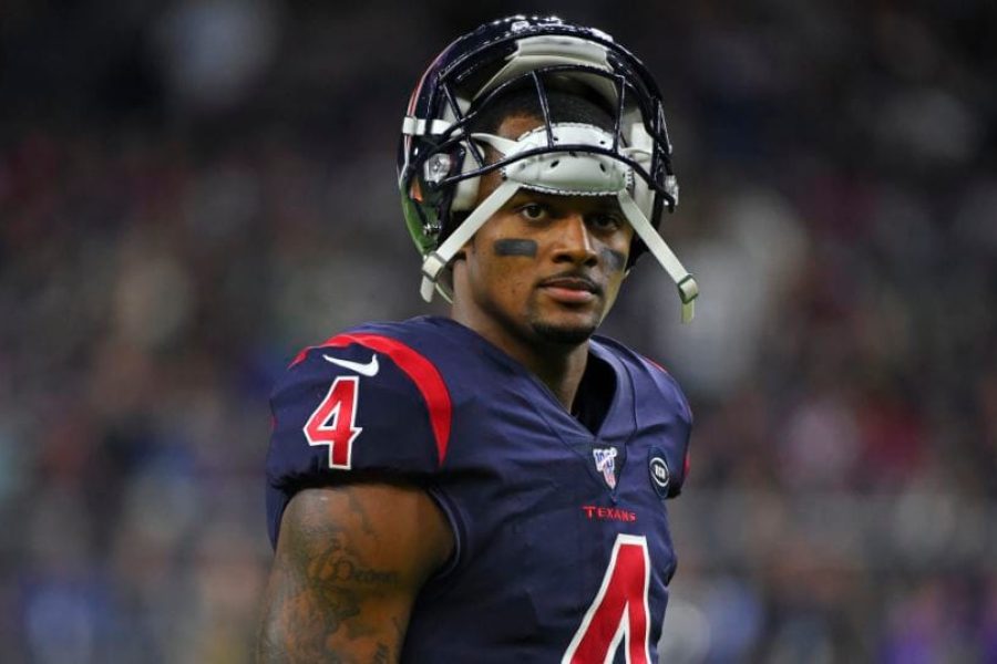 Houston Texans quarterback Deshaun Watson (4) waits as officials review a play against the New England Patriots during the second half of an NFL football game Sunday, Dec. 1, 2019, in Houston