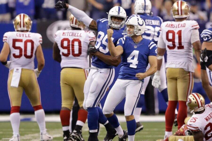 Indianapolis Colts' Adam Vinatieri (4) celebrates after kicking a game winning 51-yard field goal during overtime of an NFL football game against the San Francisco 49ers, Sunday, Oct. 8, 2017, in Indianapolis. Indianapolis won 26-23. (AP Photo/Darron Cummings)
