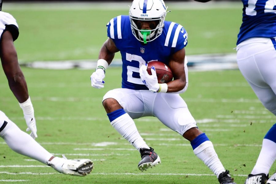 Sep 13, 2020; Jacksonville, Florida, USA; Indianapolis Colts running back Nyheim Hines (21) runs with the ball  during the first quarter against the Jacksonville Jaguars at TIAA Bank Field. Mandatory Credit: Douglas DeFelice-USA TODAY Sports
