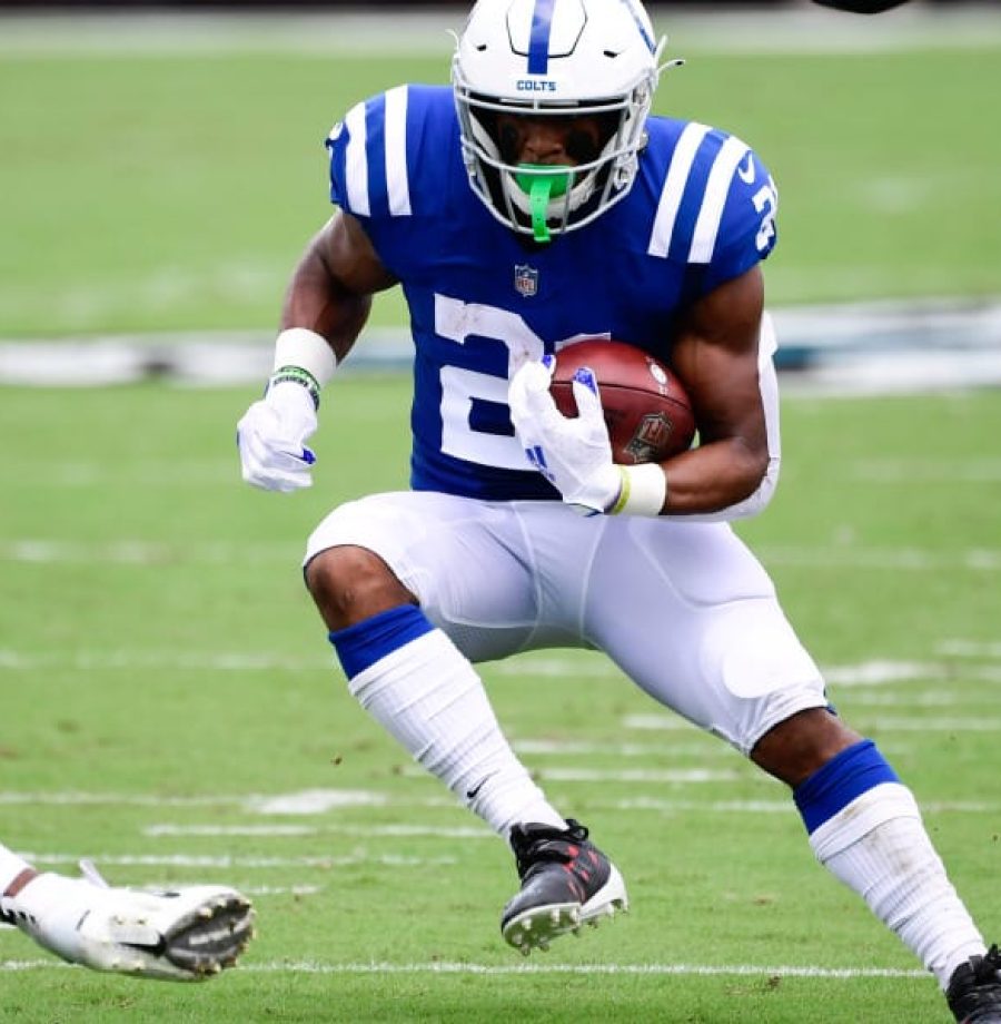 Sep 13, 2020; Jacksonville, Florida, USA; Indianapolis Colts running back Nyheim Hines (21) runs with the ball  during the first quarter against the Jacksonville Jaguars at TIAA Bank Field. Mandatory Credit: Douglas DeFelice-USA TODAY Sports