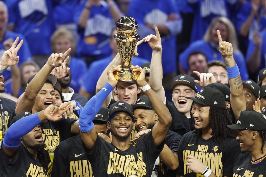 INDIANAPOLIS, IN - JUNE 22: Shai Gilgeous-Alexander #2 of the Oklahoma City Thunder celebrates winning the Bill Russell NBA Finals Most Valuable Player trophy after winning Game Seven of the 2025 NBA Finals against the Indiana Pacers on June 22, 2025 at Gainbridge Fieldhouse in Indianapolis, Indiana. NOTE TO USER: User expressly acknowledges and agrees that, by downloading and or using this Photograph, user is consenting to the terms and conditions of the Getty Images License Agreement. Mandatory Copyright Notice: Copyright 2025 NBAE (Photo by Logan Riely /NBAE via Getty Images)