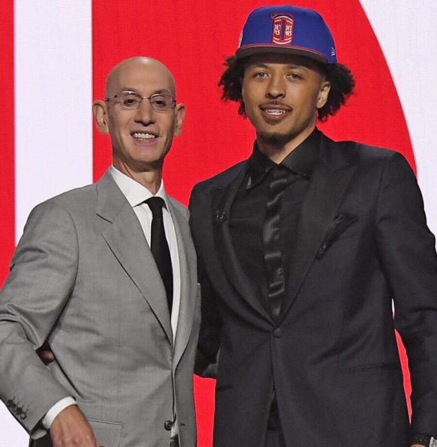 BROOKLYN, NY - JULY 29: Cade Cunningham shakes hands with NBA Commissioner Adam Silver after being selected number one overall by the Detroit Pistons during the 2021 NBA Draft on July 29, 2021 at Barclays Center in Brooklyn, New York. NOTE TO USER: User expressly acknowledges and agrees that, by downloading and or using this photograph, User is consenting to the terms and conditions of the Getty Images License Agreement. Mandatory Copyright Notice: Copyright 2021 NBAE (Photo by Brian Babineau/NBAE via Getty Images)