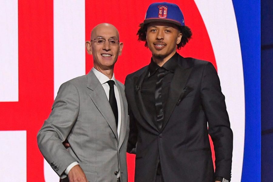 BROOKLYN, NY - JULY 29: Cade Cunningham shakes hands with NBA Commissioner Adam Silver after being selected number one overall by the Detroit Pistons during the 2021 NBA Draft on July 29, 2021 at Barclays Center in Brooklyn, New York. NOTE TO USER: User expressly acknowledges and agrees that, by downloading and or using this photograph, User is consenting to the terms and conditions of the Getty Images License Agreement. Mandatory Copyright Notice: Copyright 2021 NBAE (Photo by Brian Babineau/NBAE via Getty Images)