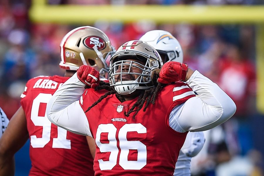 CARSON, CA - SEPTEMBER 30: Defensive tackle Sheldon Day #96 of the San Francisco 49ers celebrates sacking quarterback Philip Rivers #17 of the Los Angeles Chargers at StubHub Center on September 30, 2018 in Carson, California. (Photo by Kevork Djansezian/Getty Images)