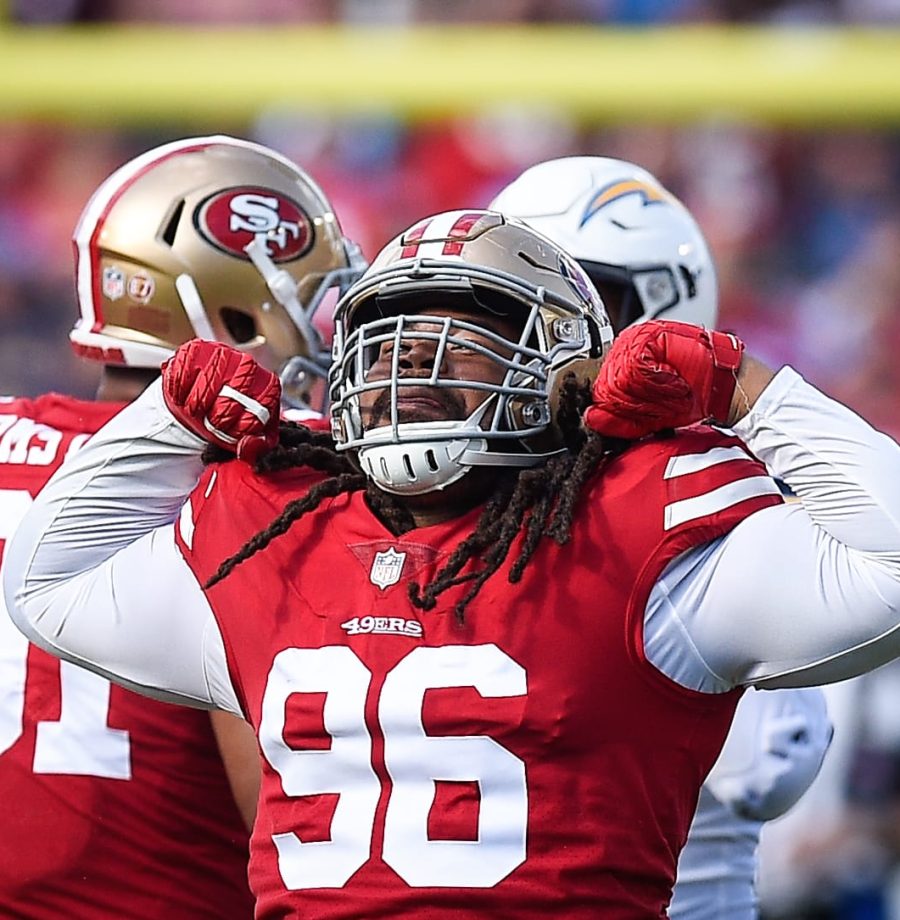 CARSON, CA - SEPTEMBER 30: Defensive tackle Sheldon Day #96 of the San Francisco 49ers celebrates sacking quarterback Philip Rivers #17 of the Los Angeles Chargers at StubHub Center on September 30, 2018 in Carson, California. (Photo by Kevork Djansezian/Getty Images)