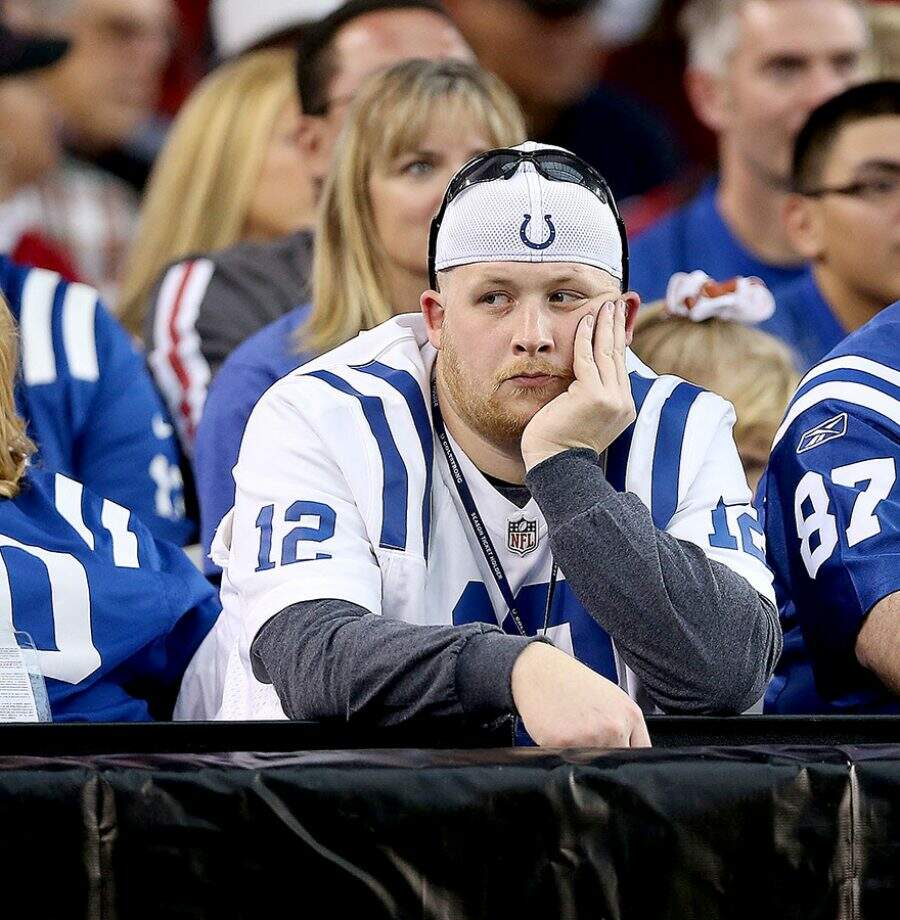 GLENDALE, AZ - NOVEMBER 24:  Fans of the Indianapolis Colts react during the NFL game against the Arizona Cardinals at the University of Phoenix Stadium on November 24, 2013 in Glendale, Arizona.  (Photo by Christian Petersen/Getty Images)
