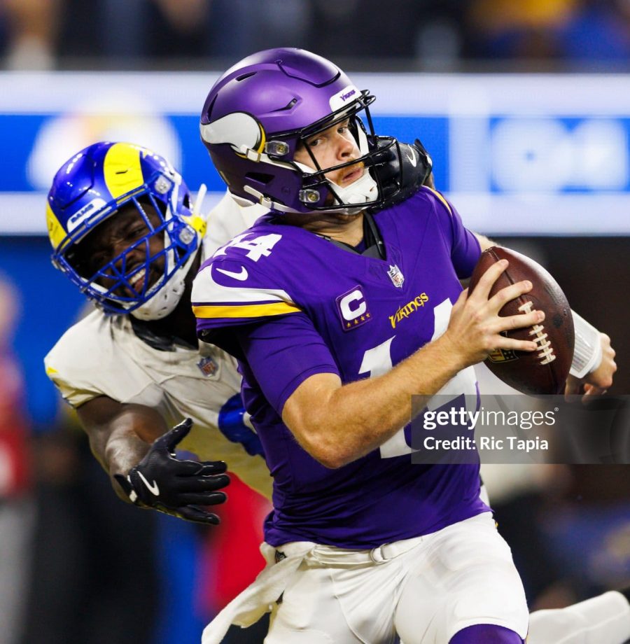 INGLEWOOD, CALIFORNIA - OCTOBER 24: Jared Verse (L) #8 of the Los Angeles Rams sacks Sam Darnold #14 of the Minnesota Vikings for a safety during the second half at SoFi Stadium on October 24, 2024 in Inglewood, California. (Photo by Ric Tapia/Getty Images)