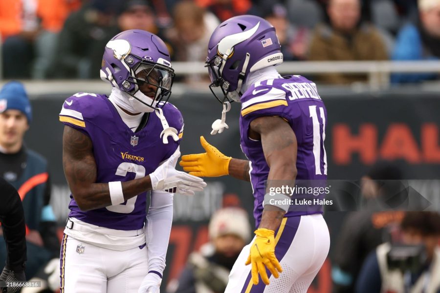 CHICAGO, ILLINOIS - NOVEMBER 24: Jordan Addison #3 and Trent Sherfield Sr. #11 of the Minnesota Vikings celebrate after a touchdown during the second quarter against the Chicago Bears at Soldier Field on November 24, 2024 in Chicago, Illinois. (Photo by Luke Hales/Getty Images)