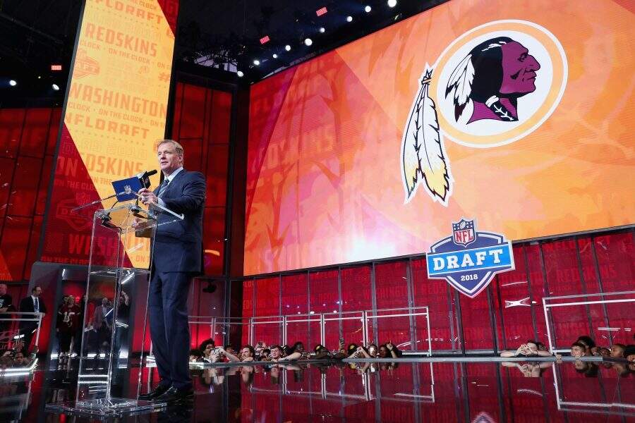 ARLINGTON, TX - APRIL 26:  NFL Commissioner Roger Goodell announces a pick by the Washington Redskins during the first round of the 2018 NFL Draft at AT&T Stadium on April 26, 2018 in Arlington, Texas.  (Photo by Tom Pennington/Getty Images)