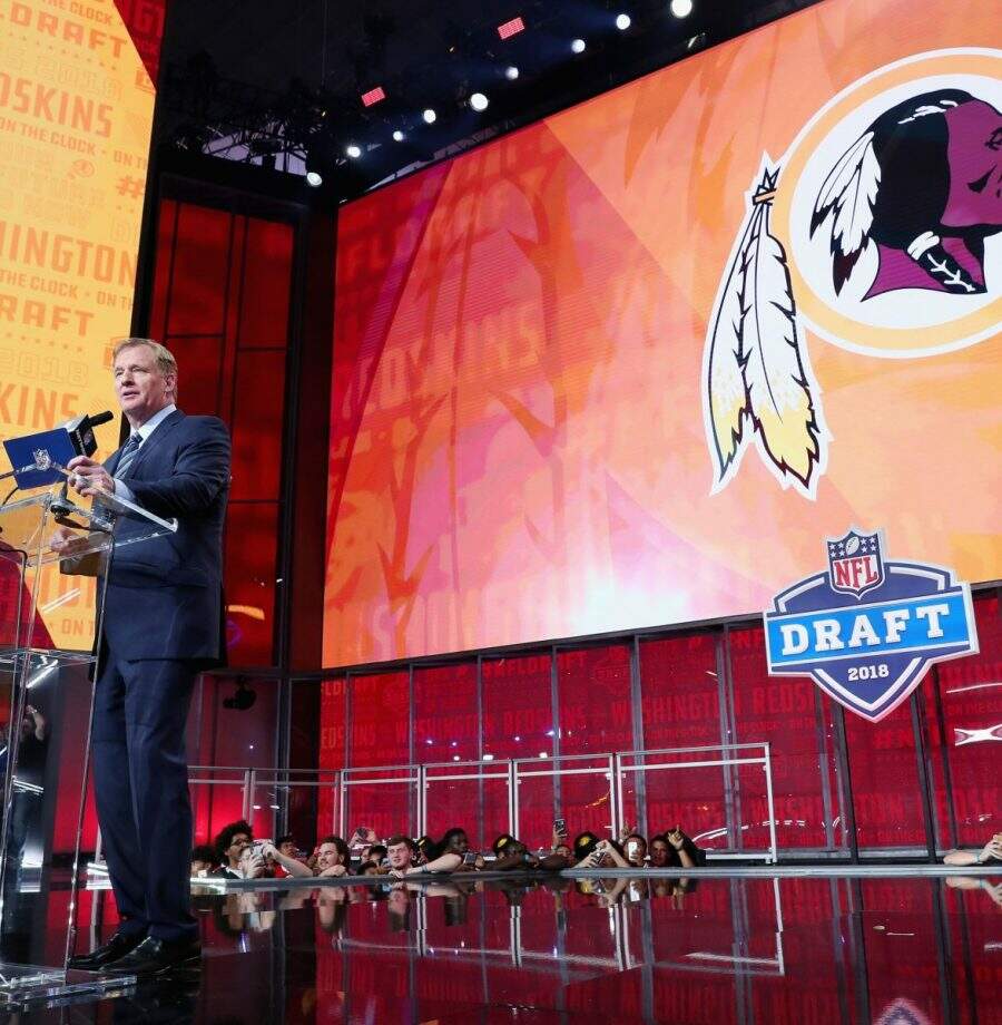 ARLINGTON, TX - APRIL 26:  NFL Commissioner Roger Goodell announces a pick by the Washington Redskins during the first round of the 2018 NFL Draft at AT&T Stadium on April 26, 2018 in Arlington, Texas.  (Photo by Tom Pennington/Getty Images)