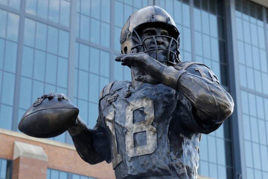 The Peyton Manning statue is seen outside of Lucas Oil Stadium, Saturday, Oct. 7, 2017, in Indianapolis. (AP Photo/Darron Cummings)