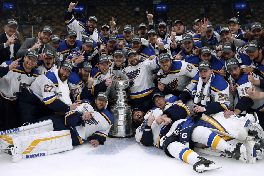 The St. Louis Blues celebrate with the Stanley Cup after they defeated the Boston Bruins in Game 7 of the NHL Stanley Cup Final, Wednesday, June 12, 2019, in Boston. (AP Photo/Michael Dwyer)